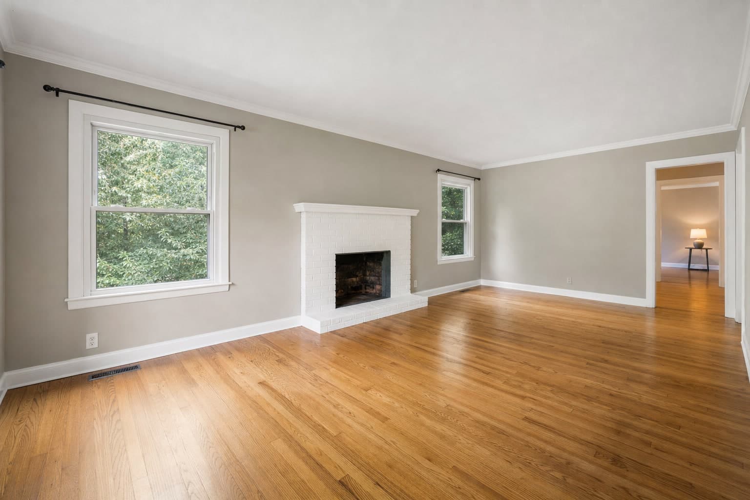 An empty room virtually staged with furniture — before