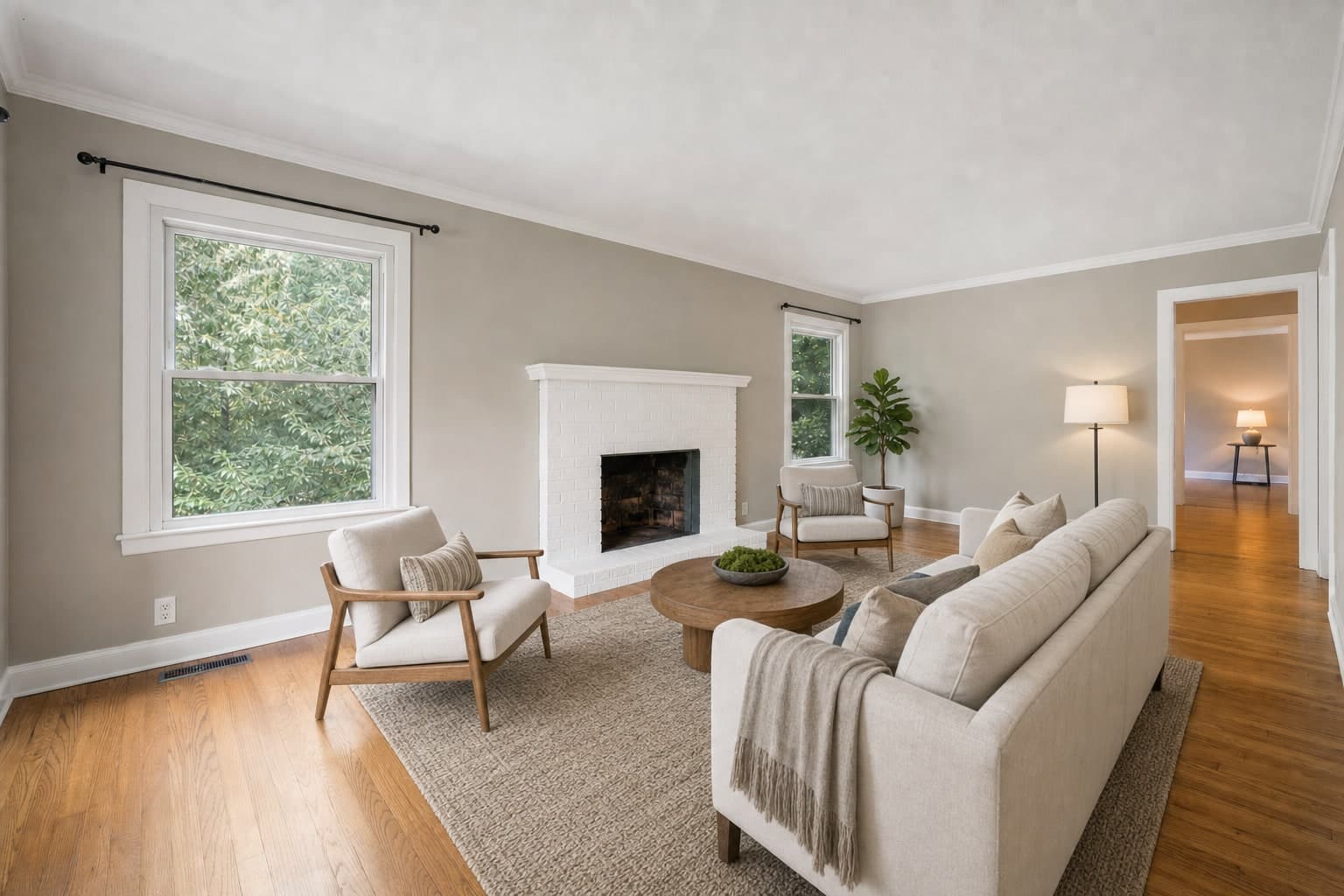 An empty room virtually staged with furniture — after